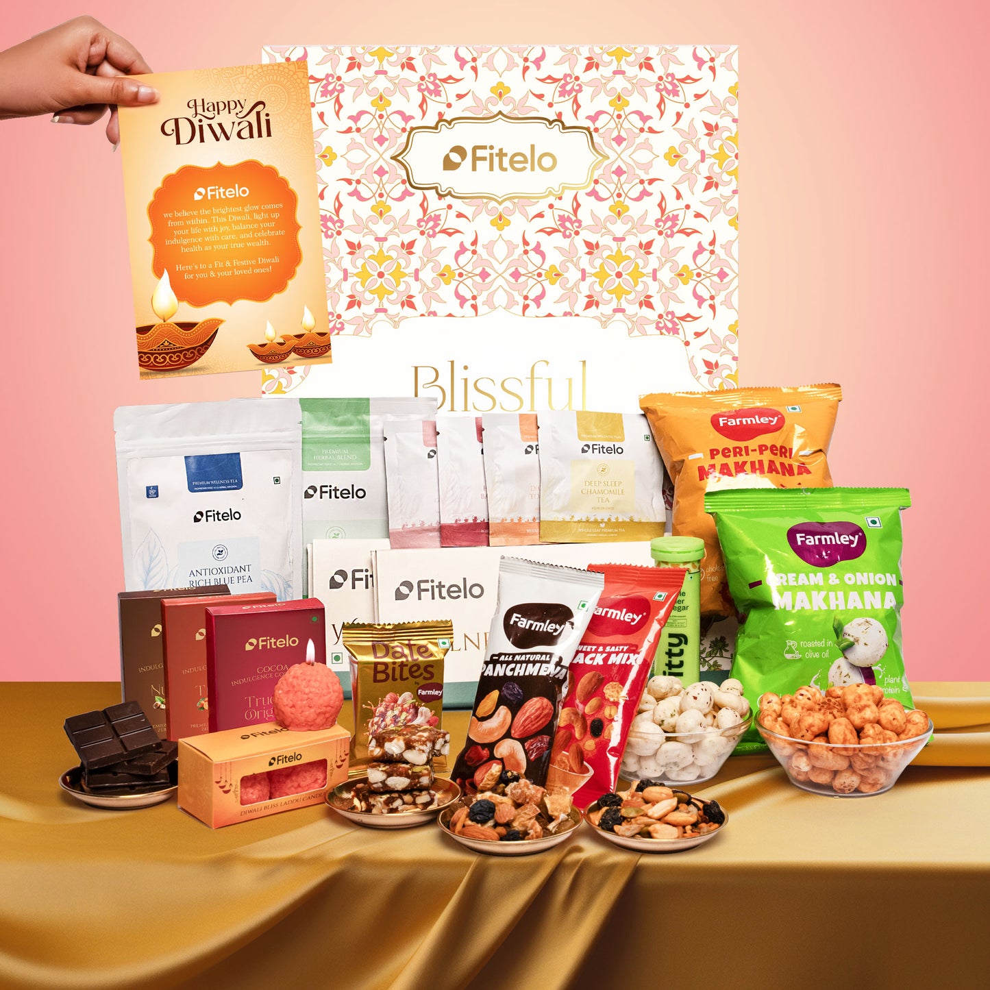 Fitelo Luxury Diwali Gift Hamper | 25-in-1 Healthy Gift Pack with Sugar Free Chocolates, Herbal Teas, ACV Effervescent, Dry Fruits, Makhana, Candles & Greeting Card